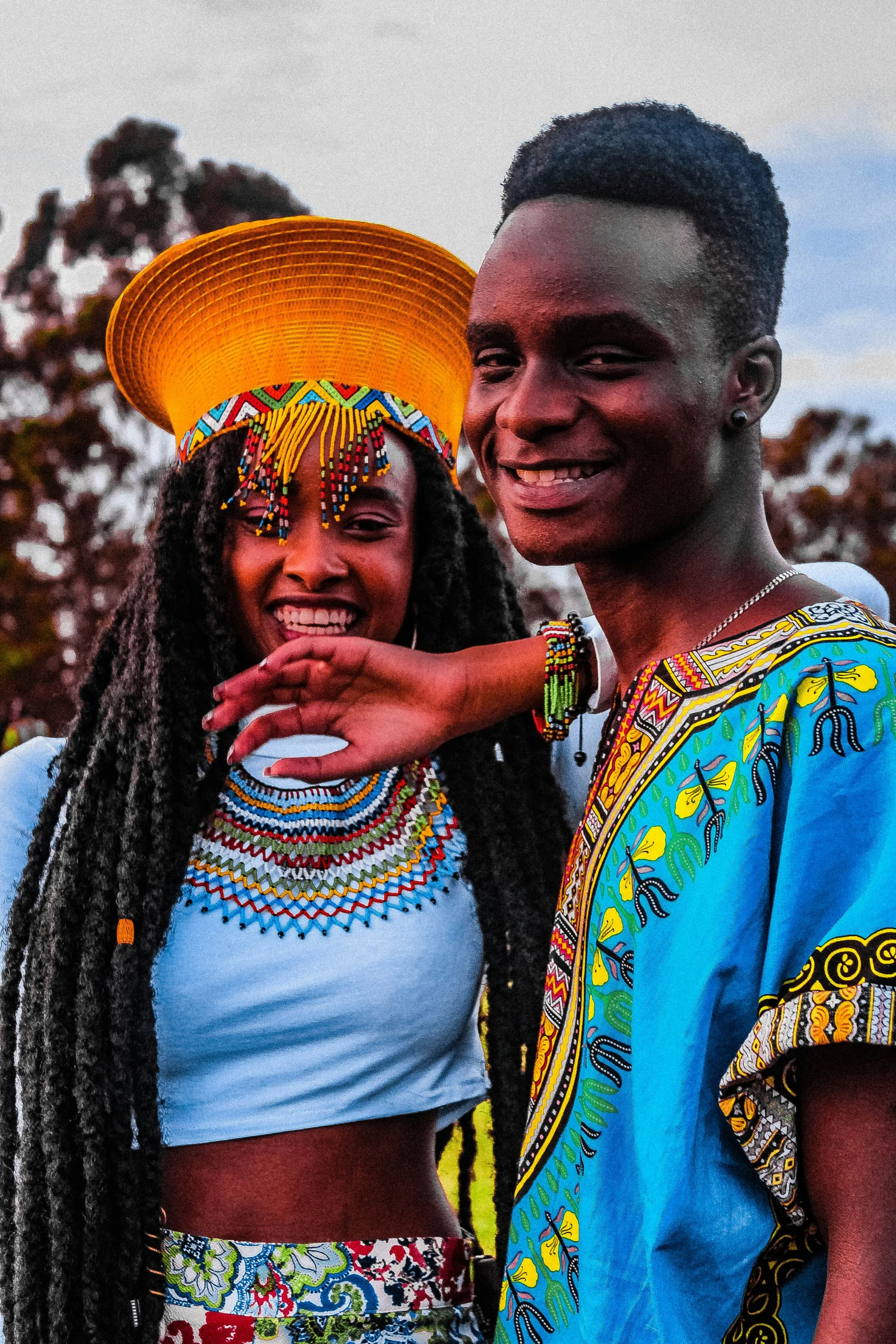 a smiling couple poses for a pograph together