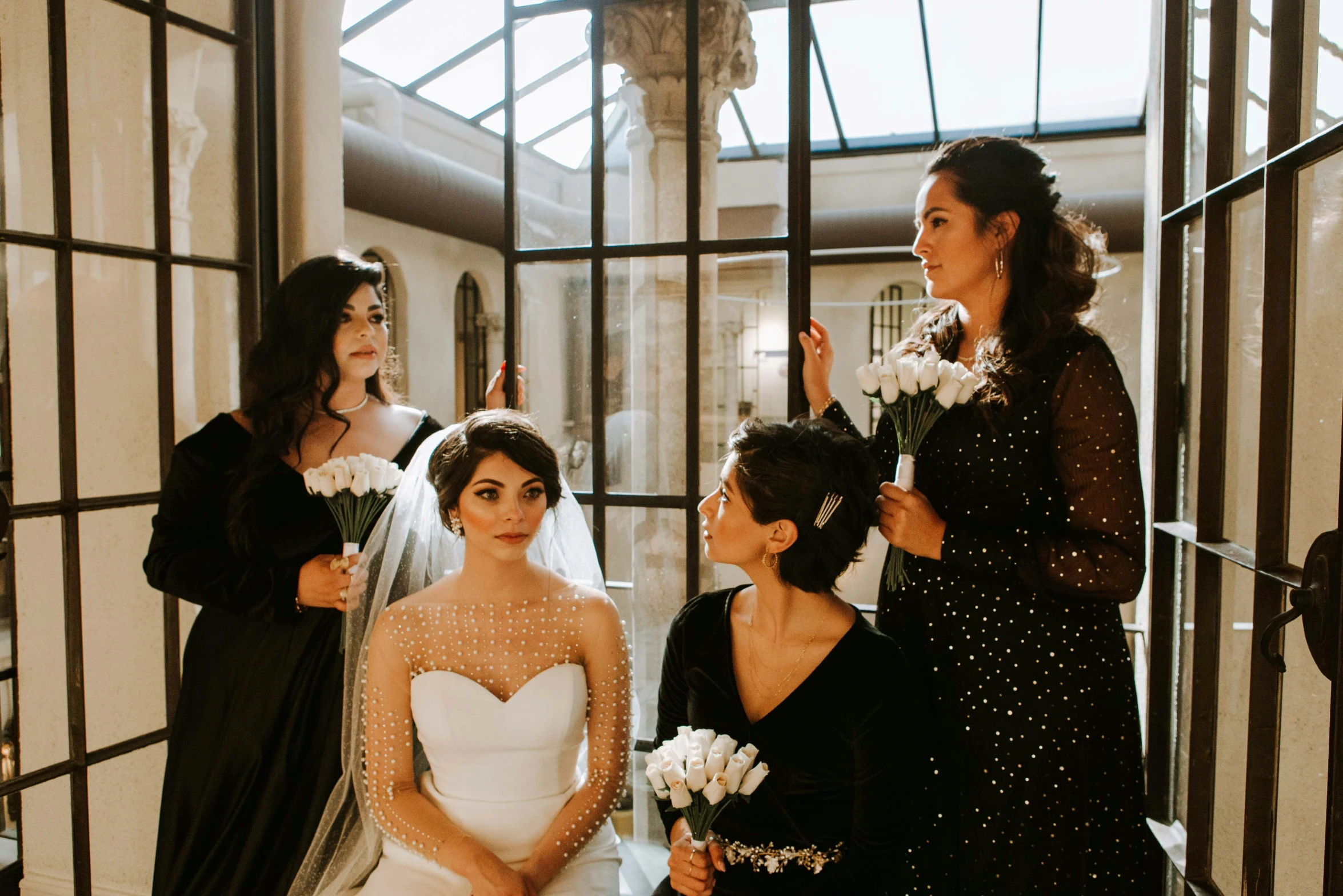 several brides standing near each other in the lobby