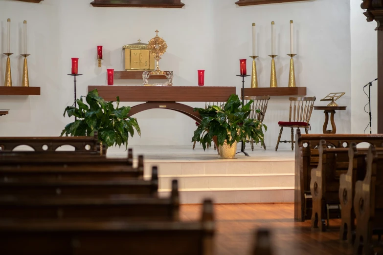 a very big pretty room with a big nice altar