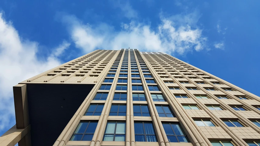 a tall building with lots of windows in front