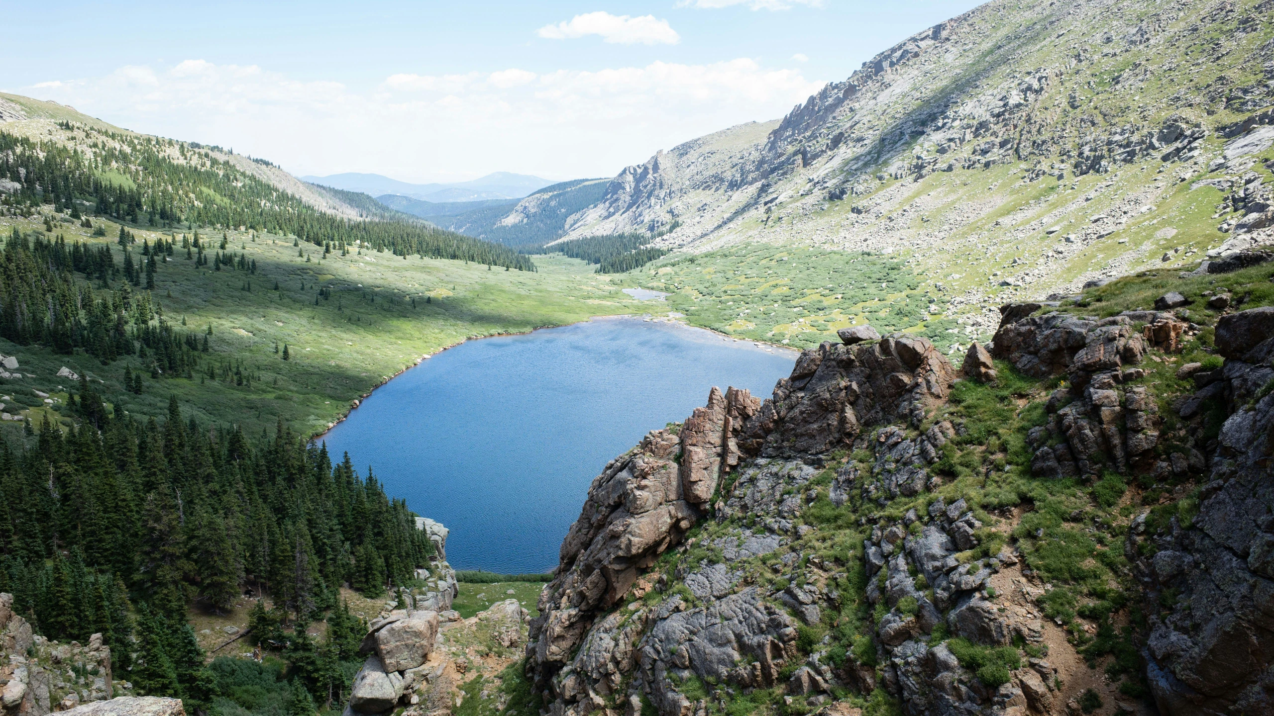 a view from a mountain on the lake