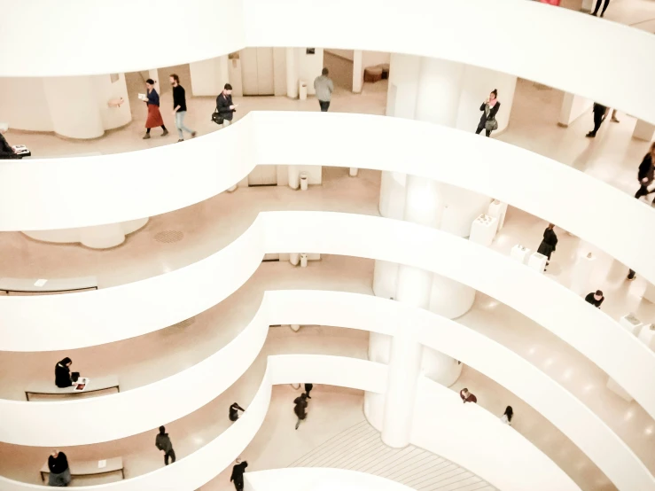 an overhead view shows people in different ways inside a building