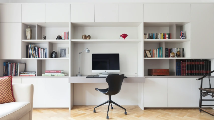 white shelves and desk in a home office area