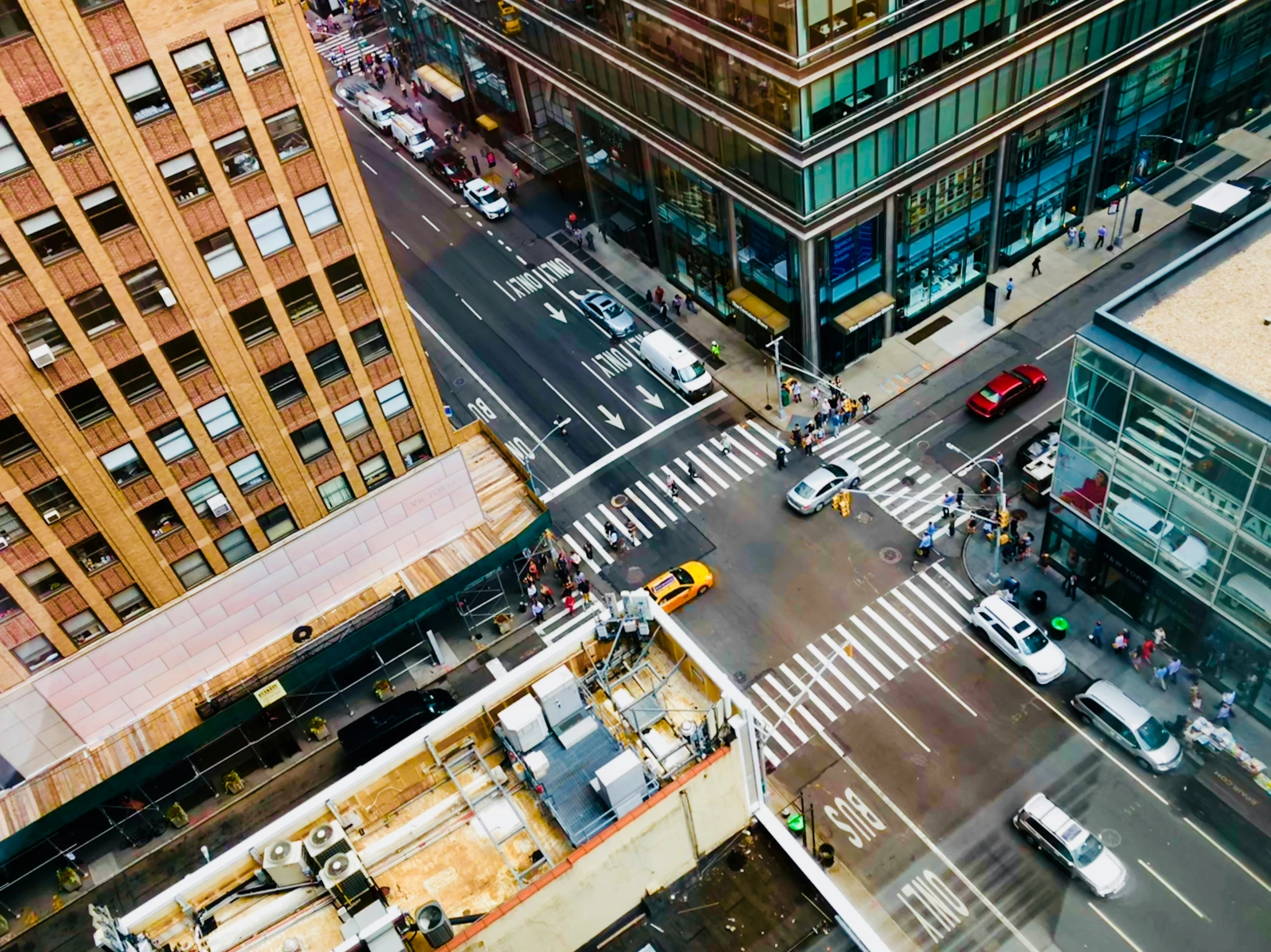 the view from above of a street and buildings