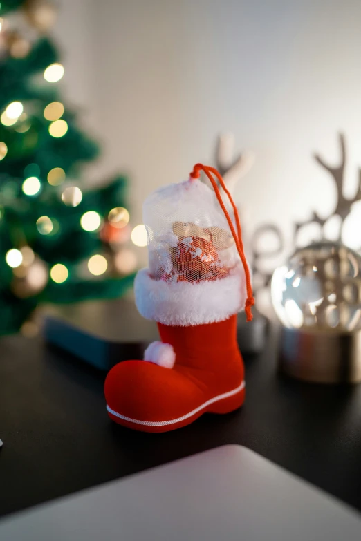 a pair of feet with a small sock in the shape of a stocking