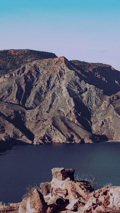 a lake that has some rocks on it