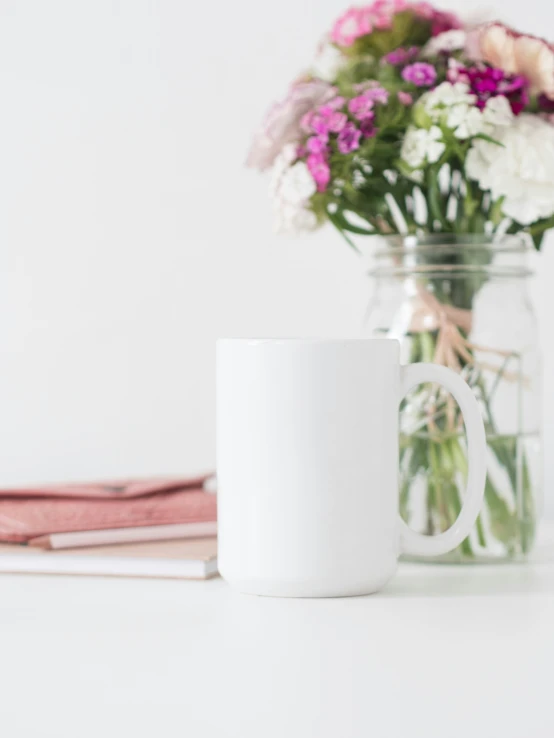 a white mug is sitting on a table