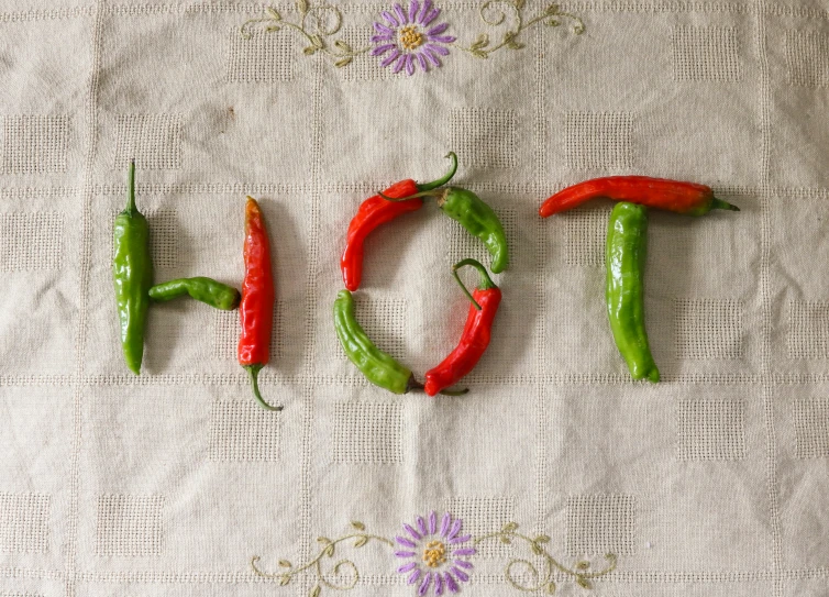 a picture of a word made up of  peppers