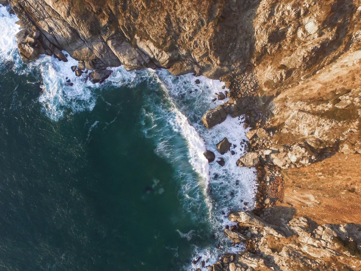 an aerial view of water in the ocean