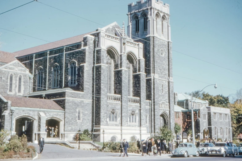 large ornate church sitting on corner near street