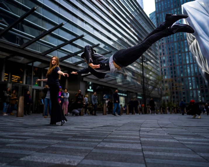 a man is doing tricks on the ground