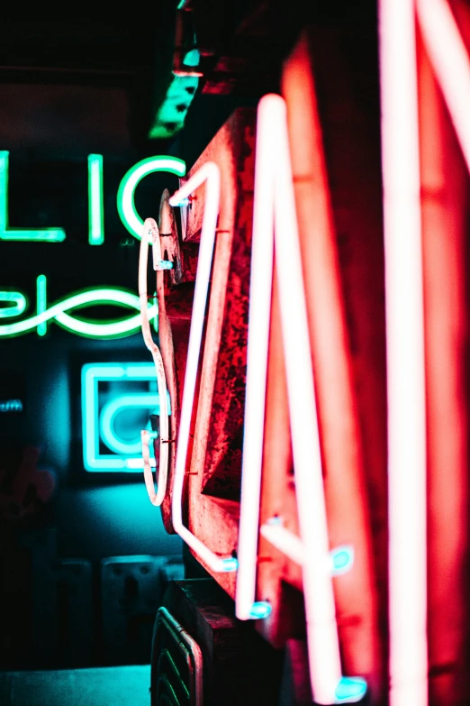 a neon sign for public space above a bar