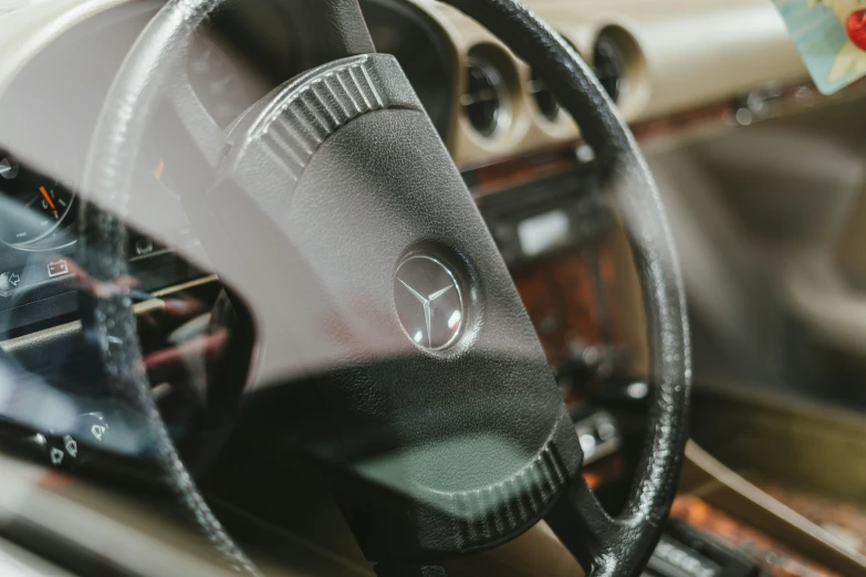 a steering wheel and dashboard of a car