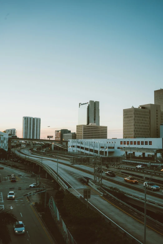 view of a city with a train on the tracks