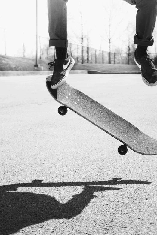 a person jumping a skateboard in the air