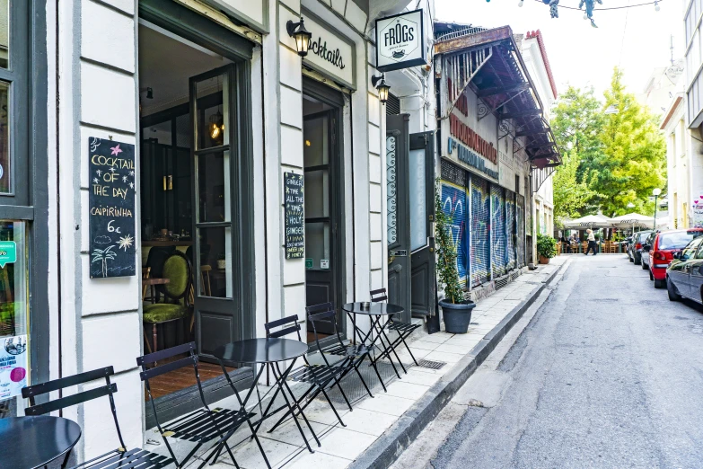 this is an image of a sidewalk outside of a restaurant