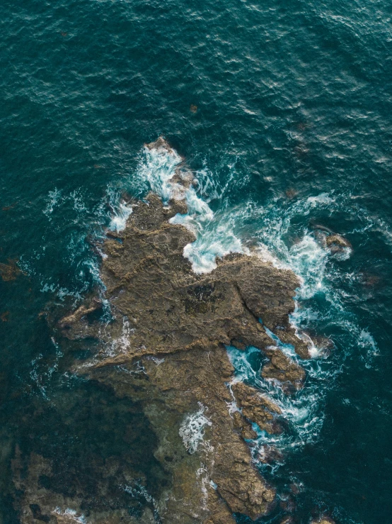 the rocks have been hed back into the ocean