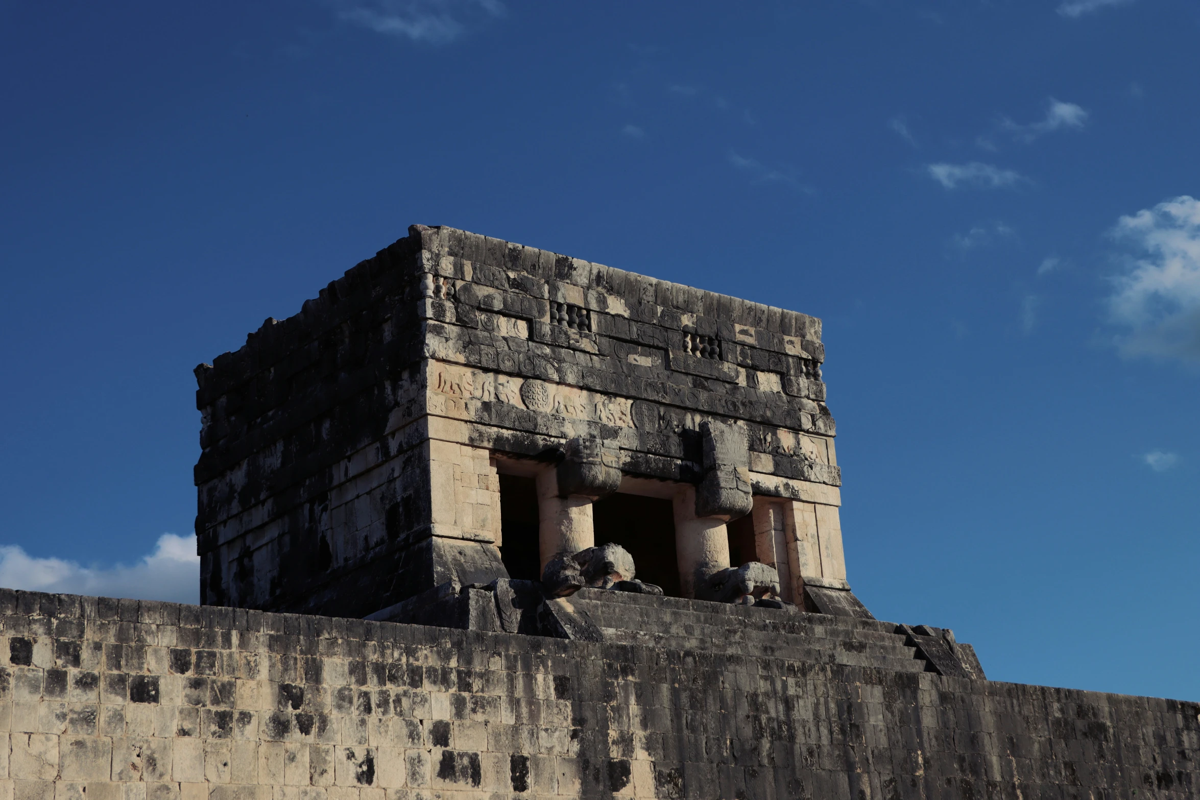 the wall has been carved out to protect from a few obstacles