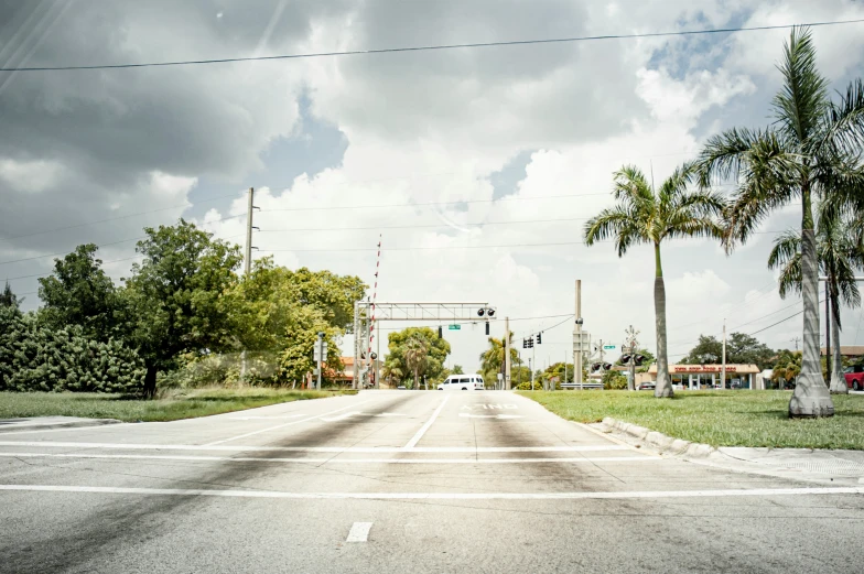 a deserted street under an overcast sky