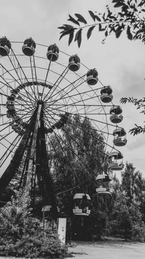 black and white po of an old carnival park ride