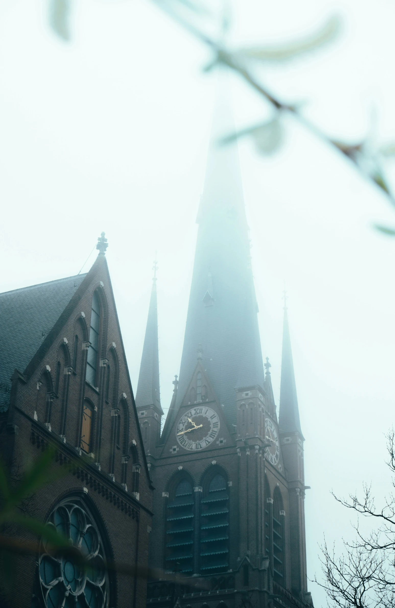 the steeple on this old church is very tall