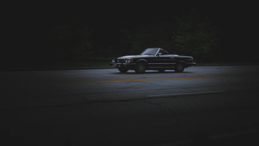 a truck is parked on a empty street