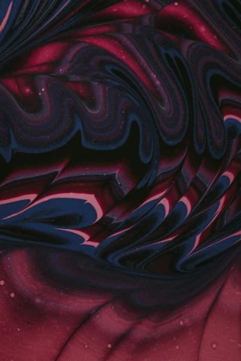 close up po of black and red swirl