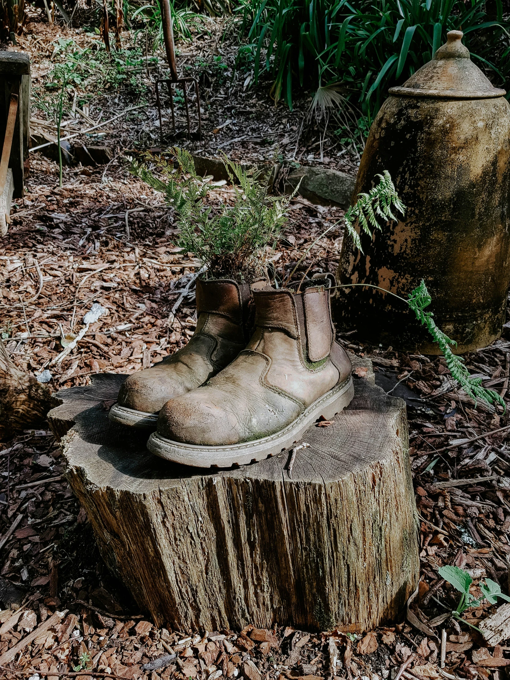 a garden sculpture made out of a tree stump