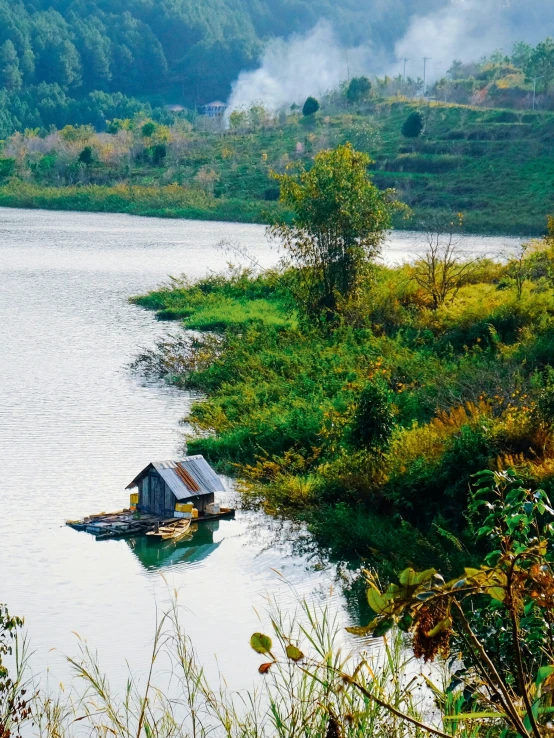 a house is sitting on top of the small dock