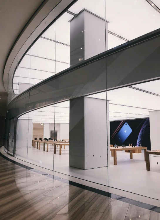 an empty building with a curved wall inside