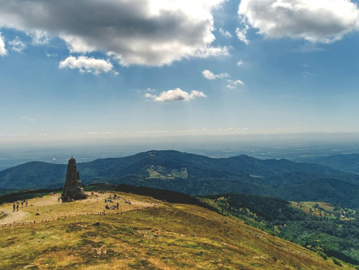 an overhanging image of the sky and mountains