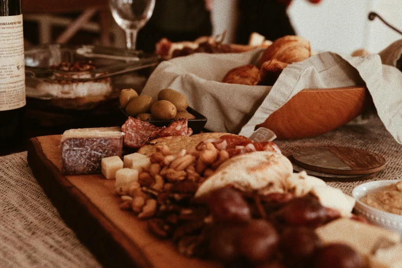 some wine glasses and food on a table