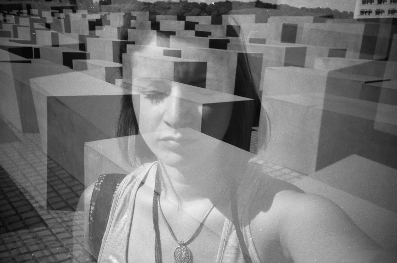 woman looking at the camera with lots of cubes around her