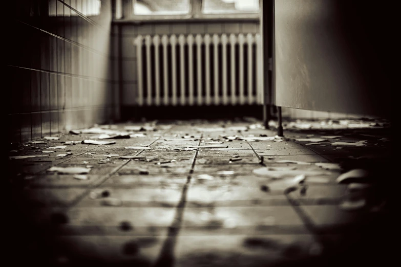 a hallway in a building with some tile