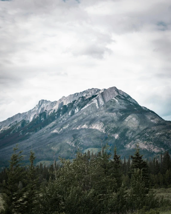 a very large mountain that is covered in snow