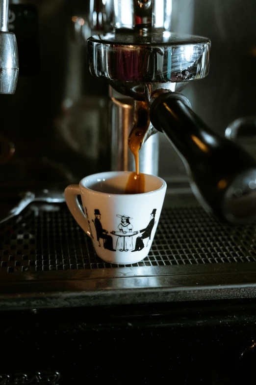 coffee being poured in the espresso machine