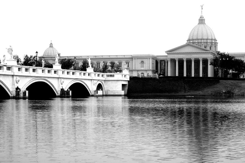 black and white po of a bridge over a river