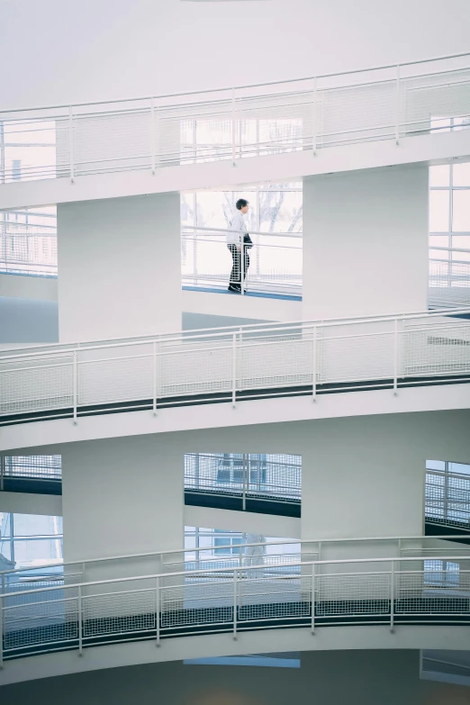the person is standing in the middle of an empty building