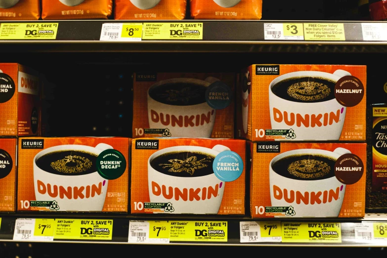 some dunkin'oatmeal cups sit in a supermarket