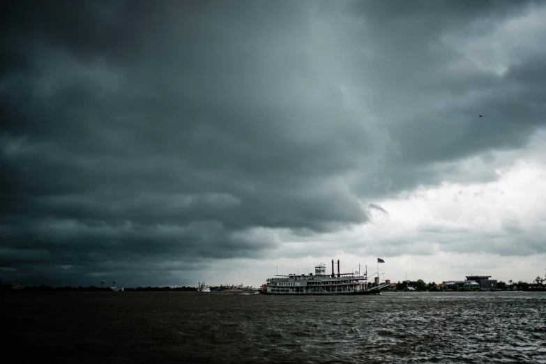 a large boat traveling on top of water