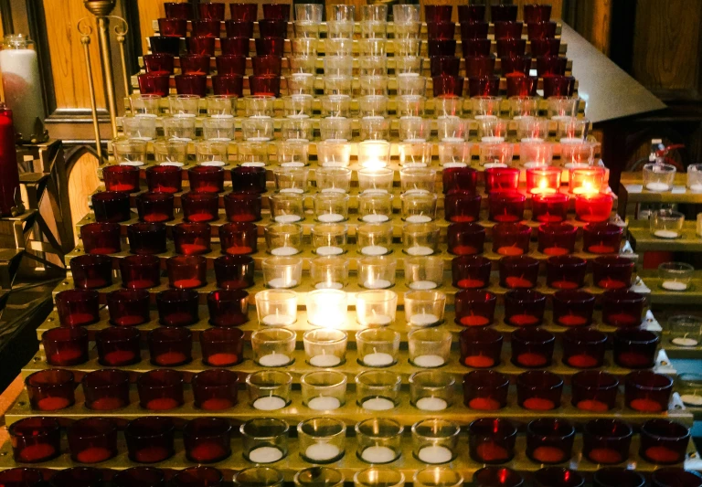 there is a table topped with wine and candles