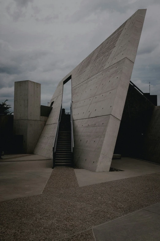 a concrete structure with stairs next to it