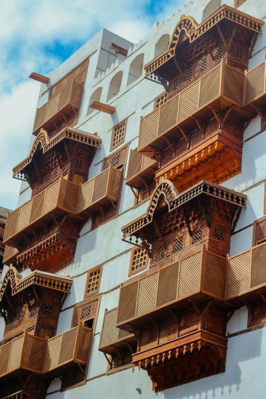 a building with wooden balconies on it