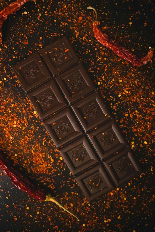 an image of chocolate pieces and chili on the floor