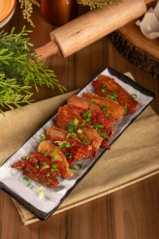 an array of meats arranged on a tray