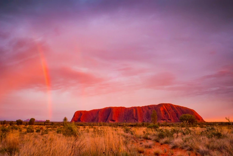 a rainbow in the sky as seen from afar