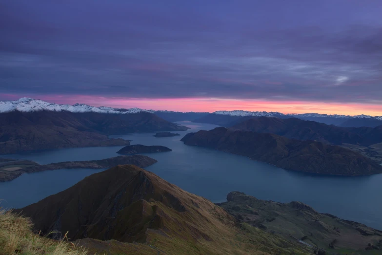 a large body of water surrounded by mountains