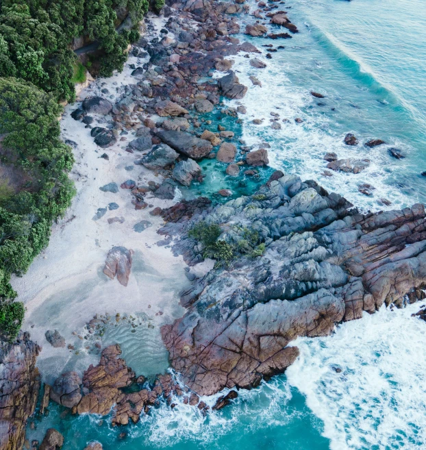 an aerial view of the ocean and coastline