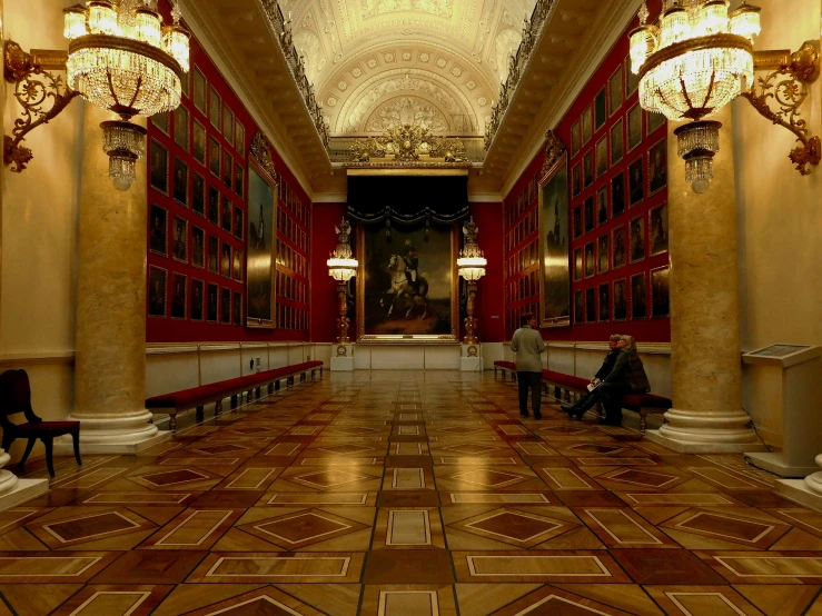 there is a room with several people on the stairs