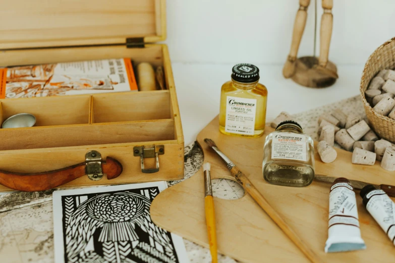 some craft supplies are laid out on the floor